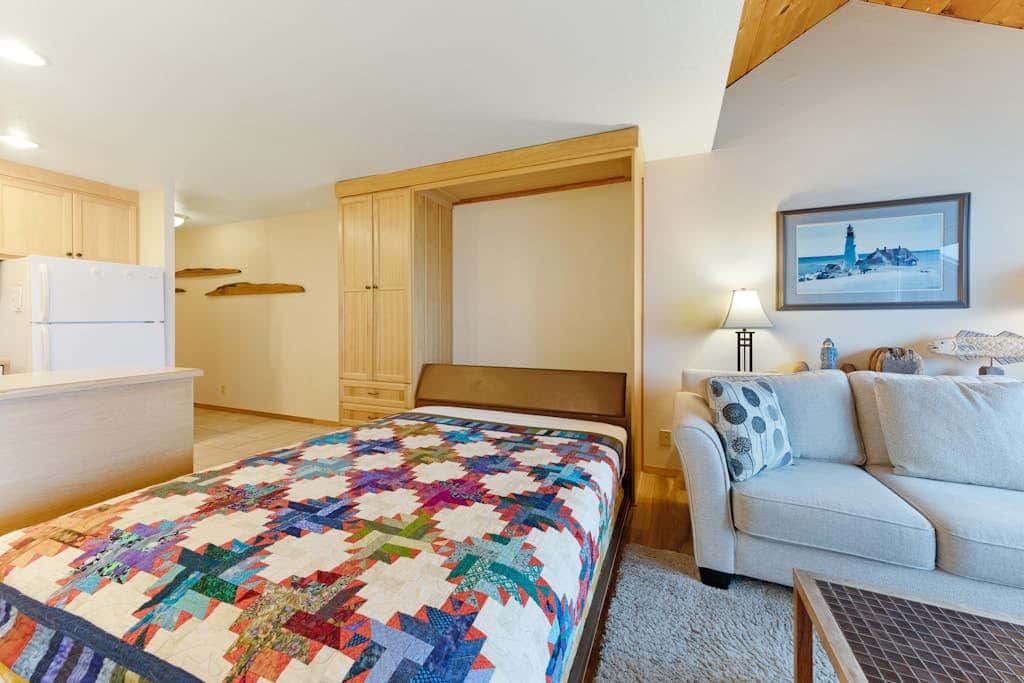 Waterfront Condo with Private Deck, Bay Views, Pool, Hot Tub, & Sauna