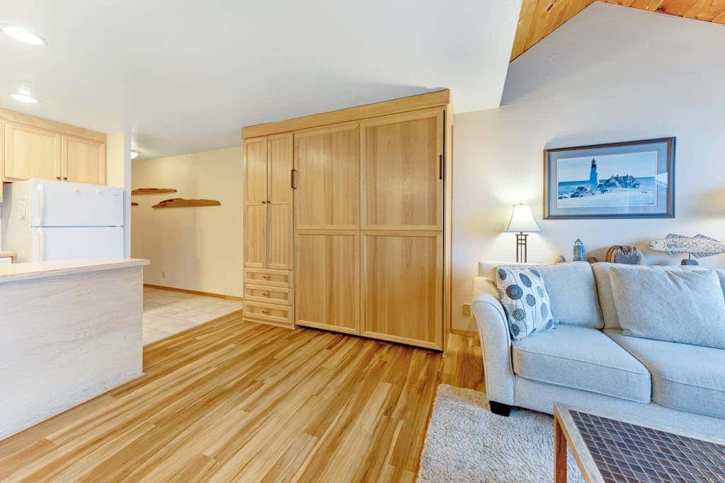 Waterfront Condo with Private Deck, Bay Views, Pool, Hot Tub, & Sauna