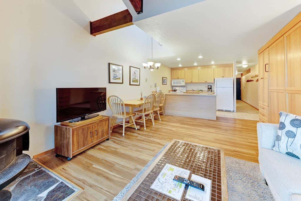 Waterfront Condo with Private Deck, Bay Views, Pool, Hot Tub, & Sauna