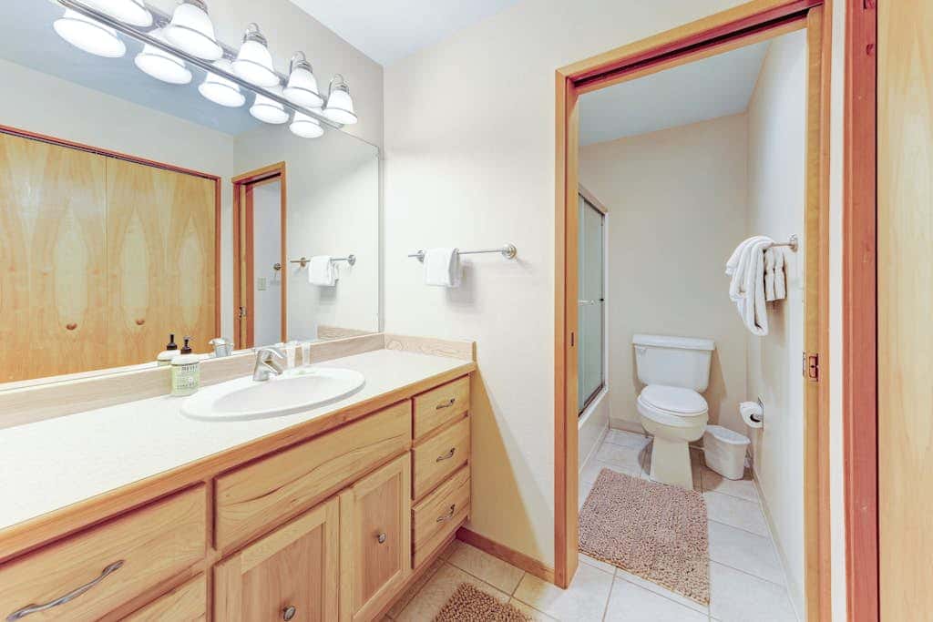 Waterfront Condo with Private Deck, Bay Views, Pool, Hot Tub, & Sauna