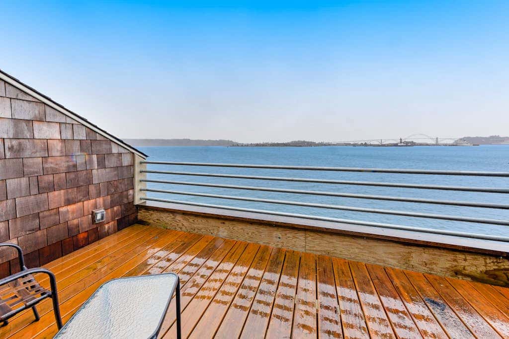 Waterfront Condo with Private Deck, Bay Views, Pool, Hot Tub, & Sauna