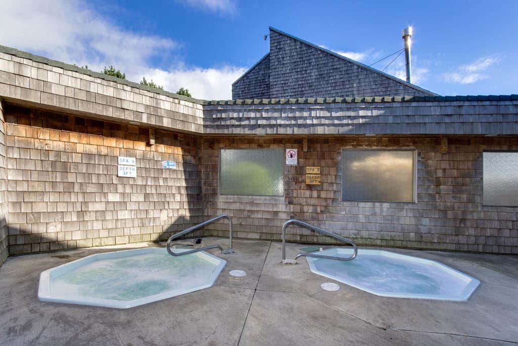 Waterfront Condo with Private Deck, Bay Views, Pool, Hot Tub, & Sauna