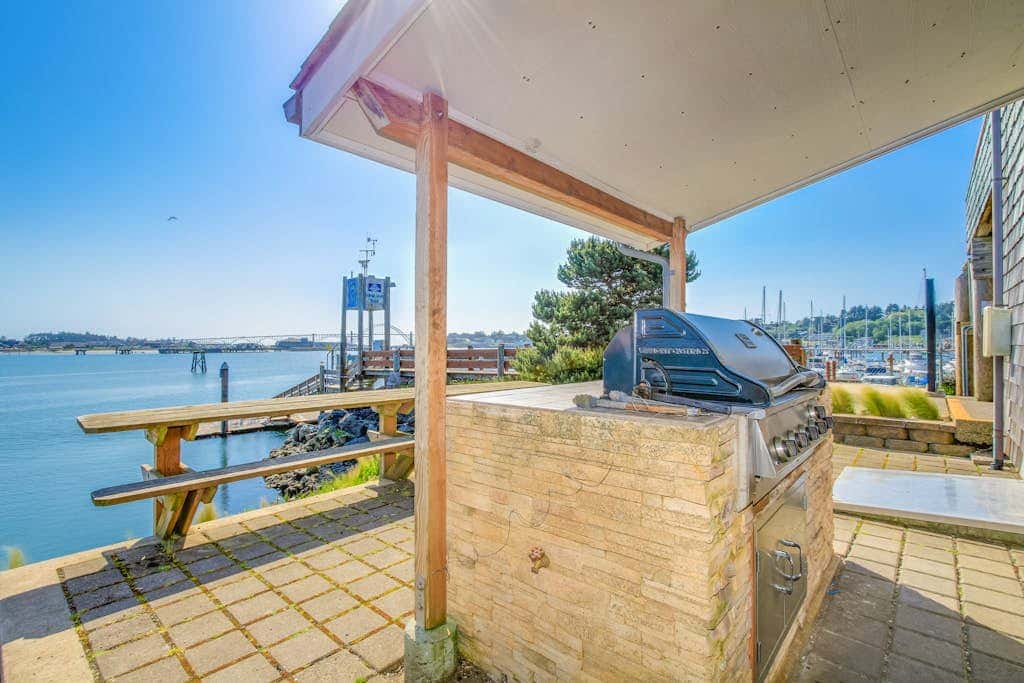 Waterfront Condo with Private Deck, Bay Views, Pool, Hot Tub, & Sauna