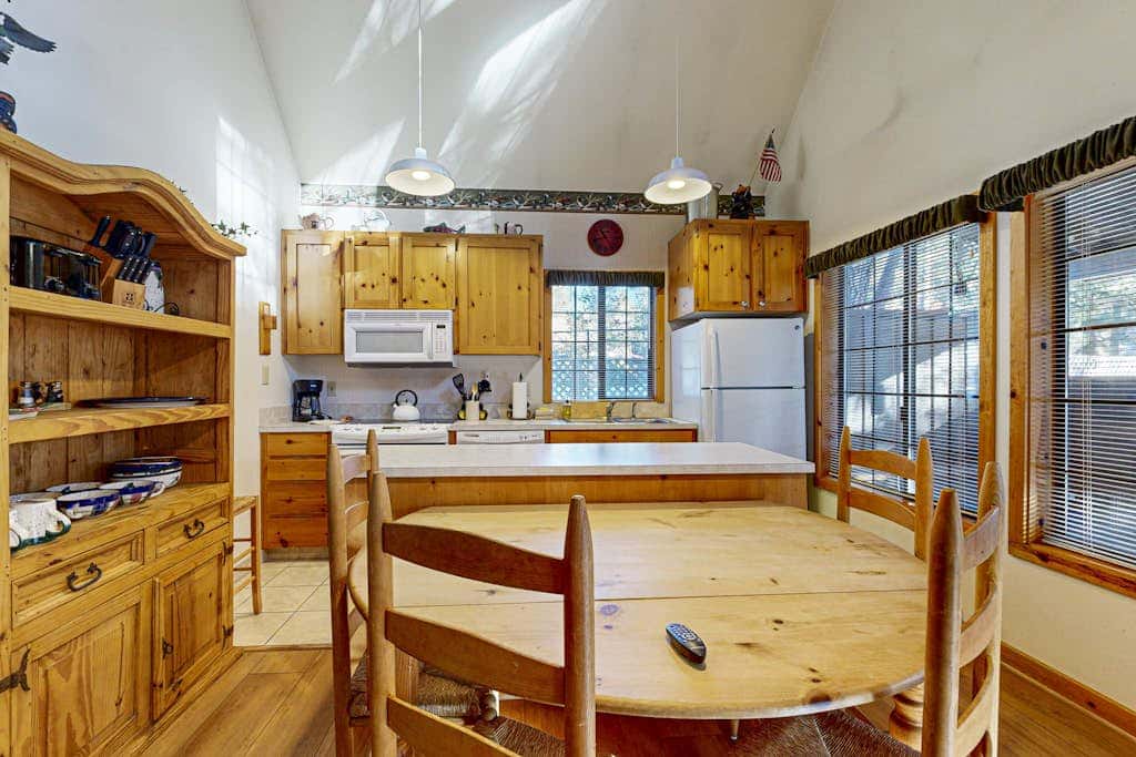 Home with spacious deck with private hot tub & SHARC access