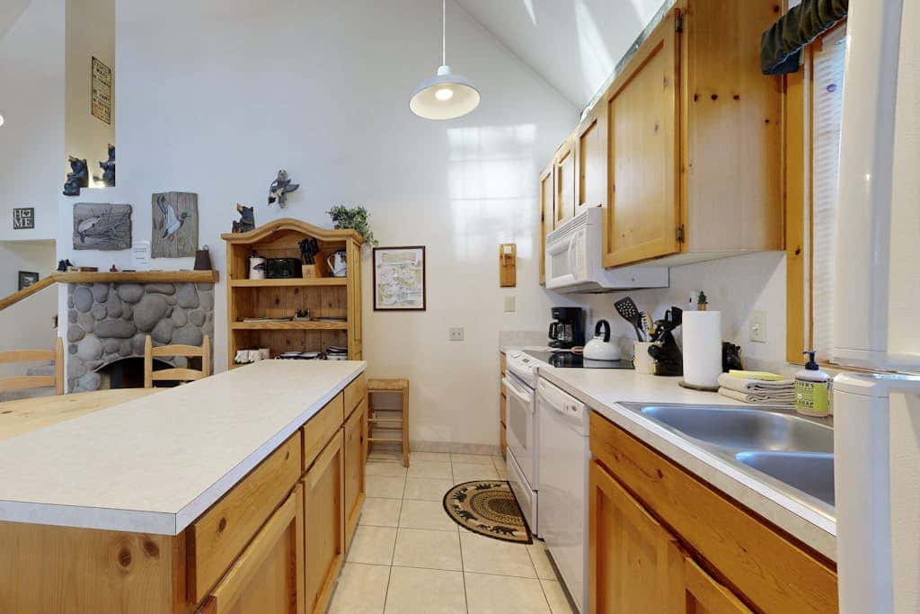 Home with spacious deck with private hot tub & SHARC access