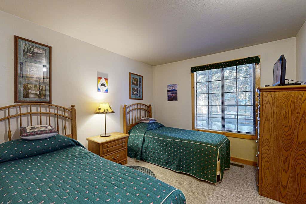 Home with spacious deck with private hot tub & SHARC access