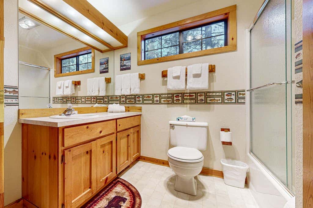 Home with spacious deck with private hot tub & SHARC access