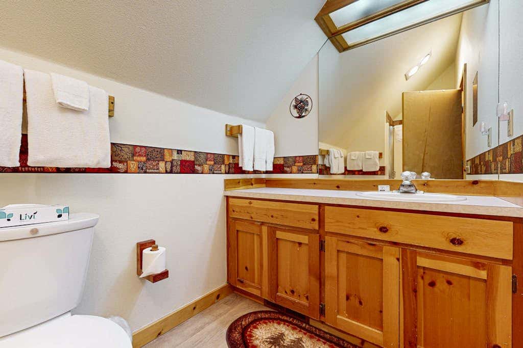 Home with spacious deck with private hot tub & SHARC access