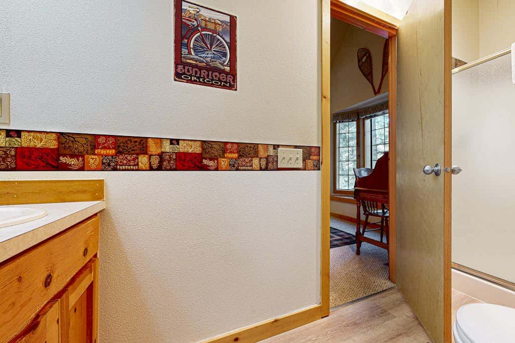 Home with spacious deck with private hot tub & SHARC access