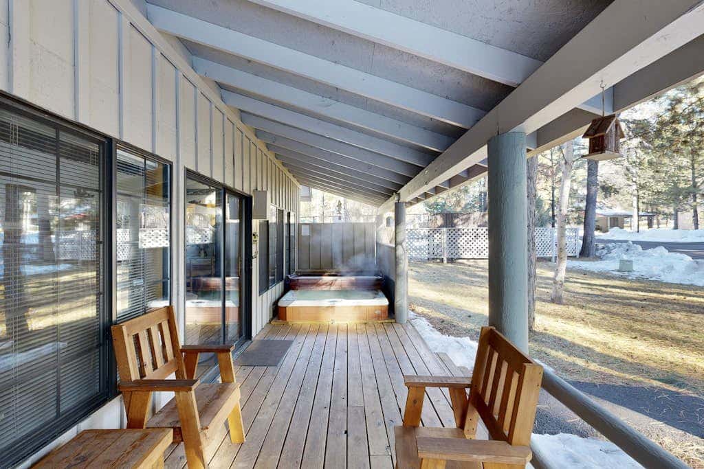 Home with spacious deck with private hot tub & SHARC access