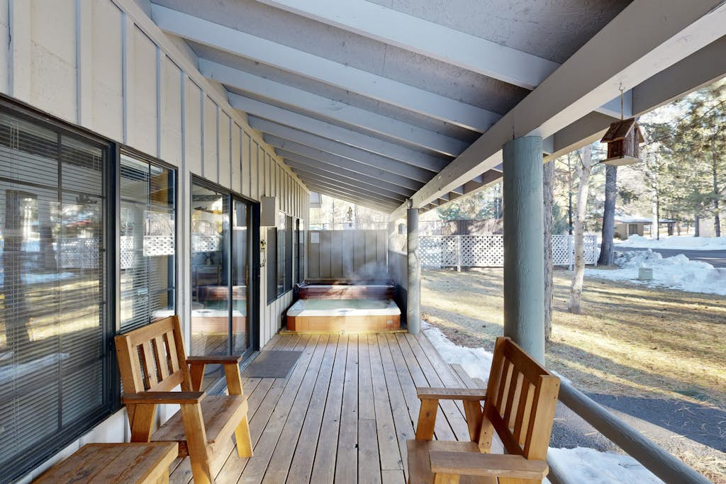 Home with spacious deck with private hot tub & SHARC access
