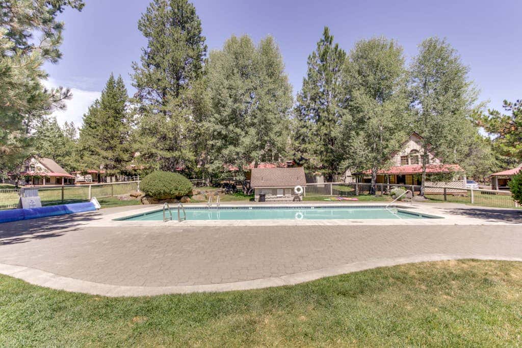 Home with spacious deck with private hot tub & SHARC access