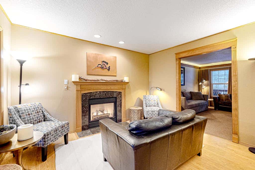 Dog-friendly home with hot tub, shared pool, firepit, fireplace, & river access