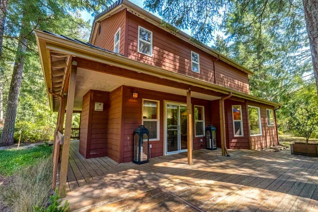 Dog-friendly home with hot tub, shared pool, firepit, fireplace, & river access