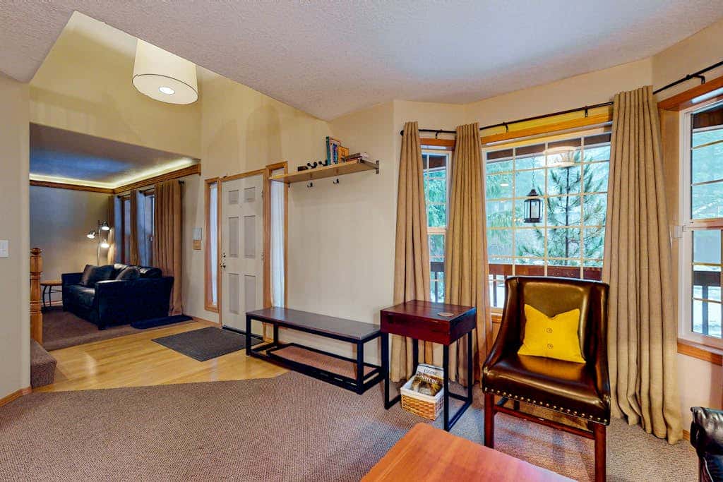 Dog-friendly home with hot tub, shared pool, firepit, fireplace, & river access