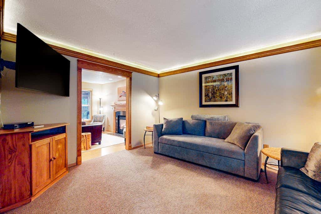Dog-friendly home with hot tub, shared pool, firepit, fireplace, & river access