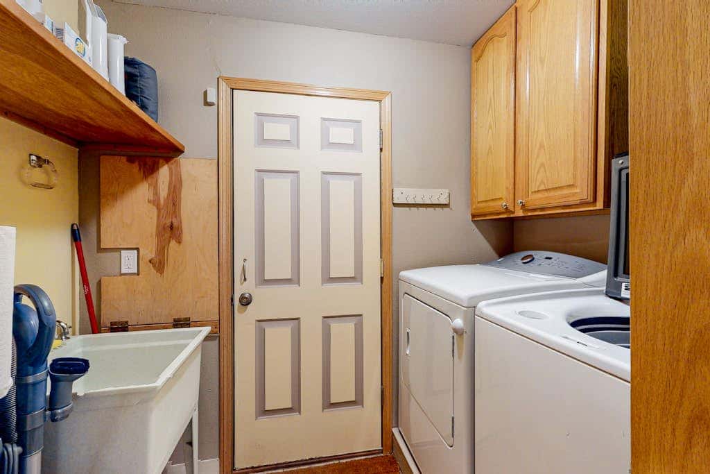 Dog-friendly home with hot tub, shared pool, firepit, fireplace, & river access