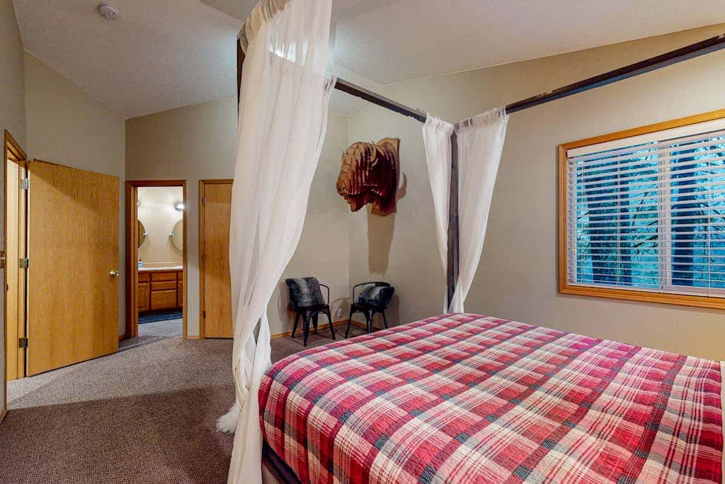 Dog-friendly home with hot tub, shared pool, firepit, fireplace, & river access
