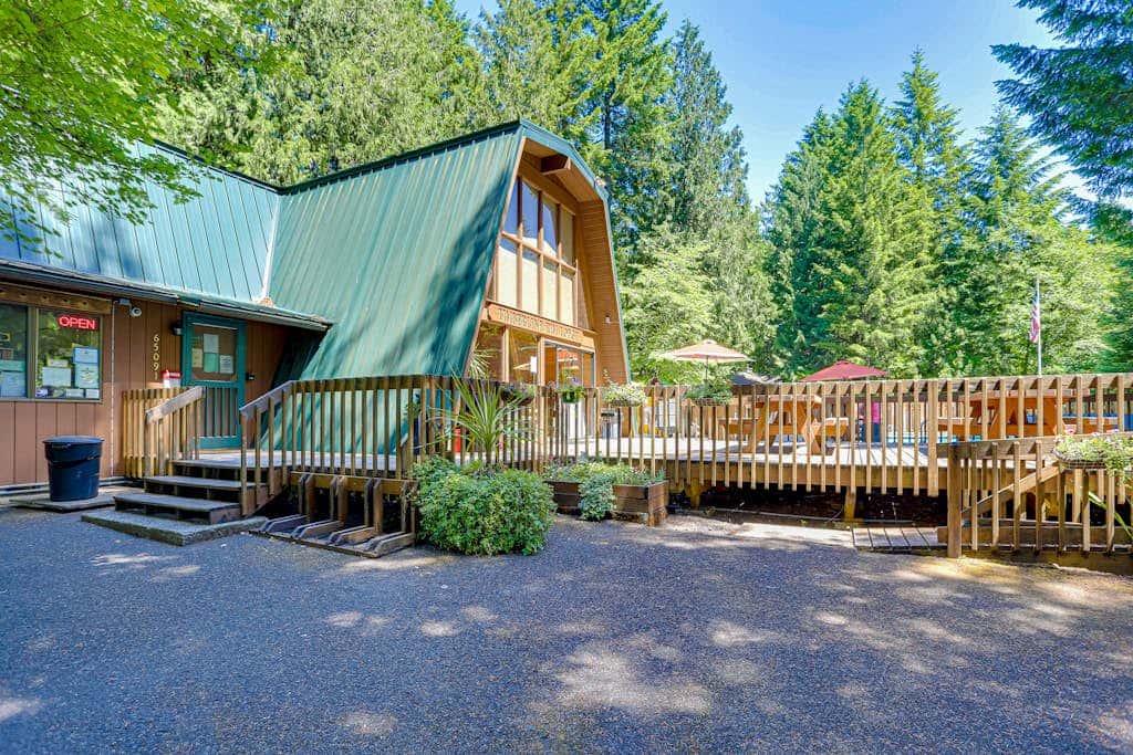 Dog-friendly home with hot tub, shared pool, firepit, fireplace, & river access