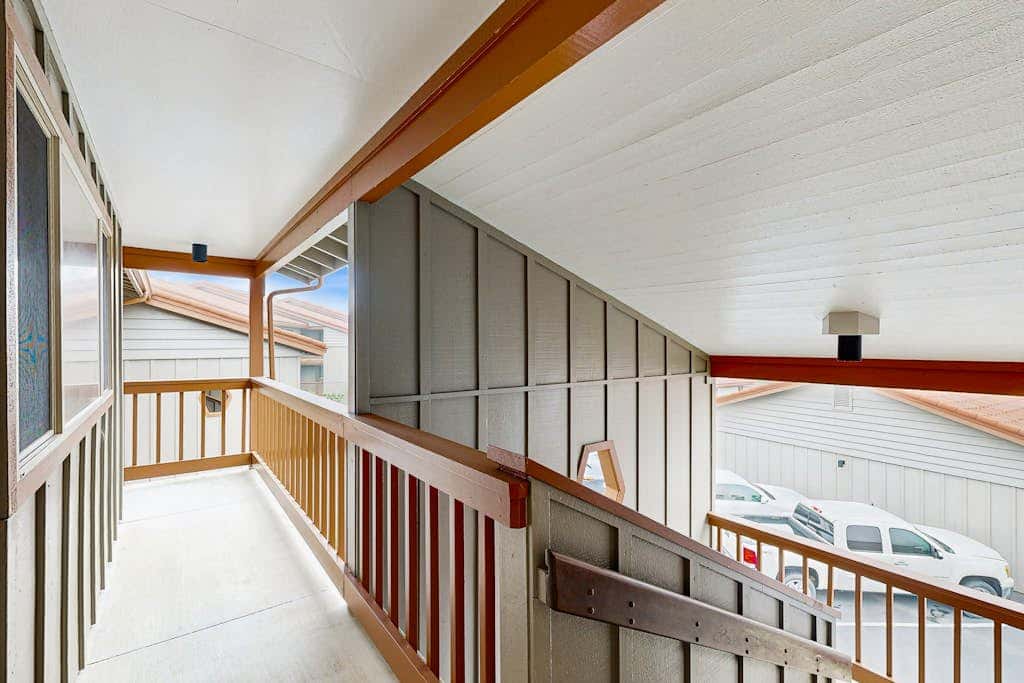 Sweeping Oceanfront Views Await Tranquil Condo with Balcony, Beach Access, W&D
