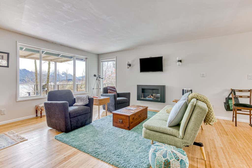 Modern, river-view home with 2 decks, Ping-Pong, fireplace & washer/dryer
