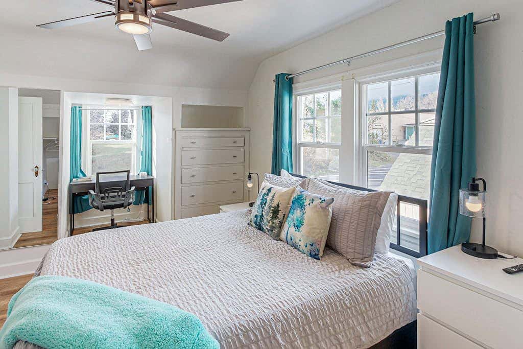 Renovated home in central location with hot tub, theater, fast wifi & work desks