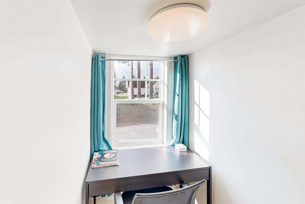 Renovated home in central location with hot tub, theater, fast wifi & work desks