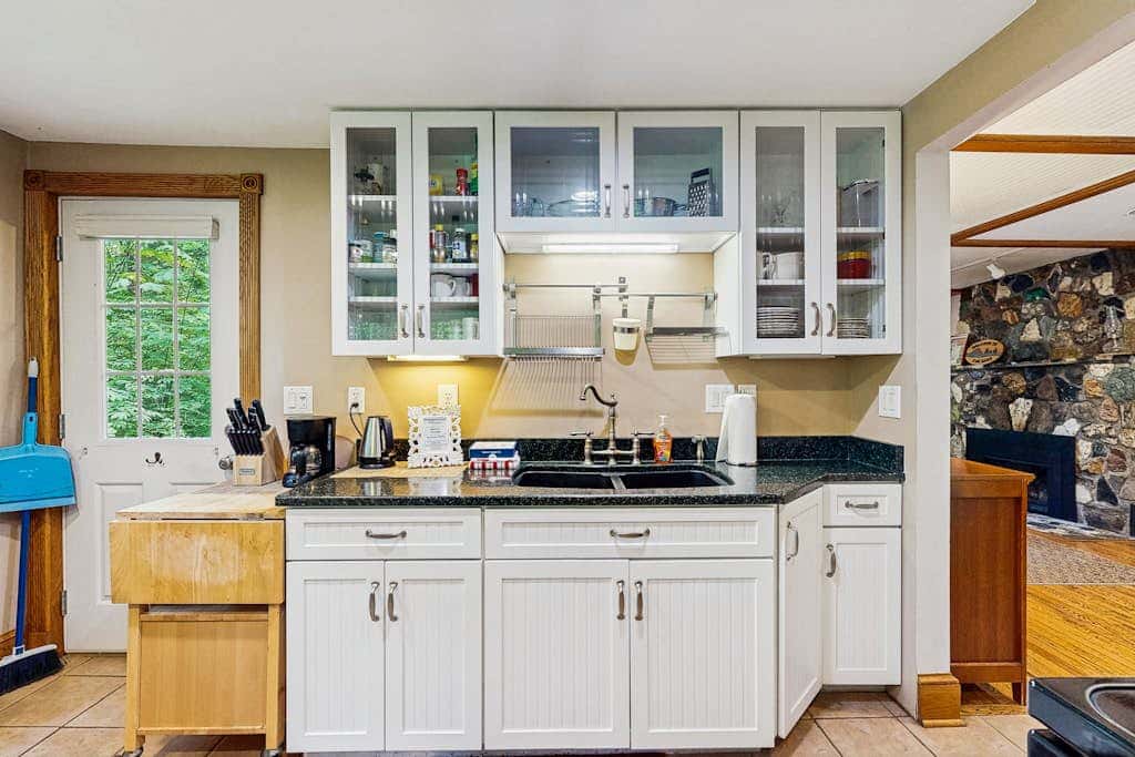 Cozy Riverfront Cottage with Charming Interior & Hot Tub - Dog-Friendly