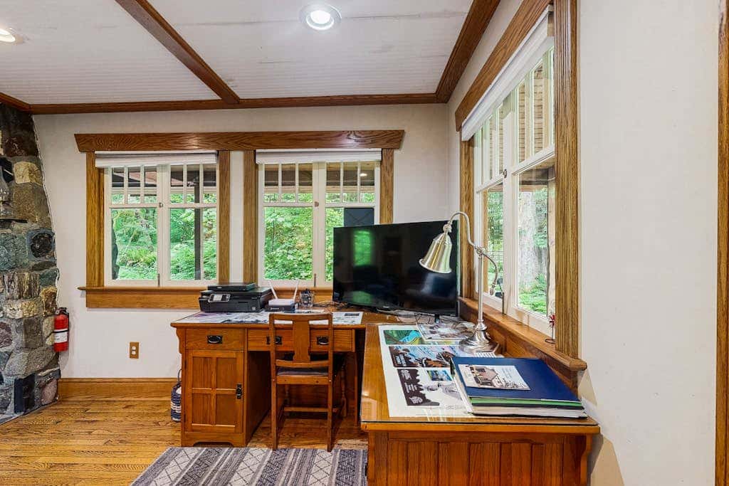 Cozy Riverfront Cottage with Charming Interior & Hot Tub - Dog-Friendly