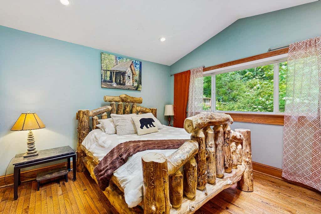 Cozy Riverfront Cottage with Charming Interior & Hot Tub - Dog-Friendly