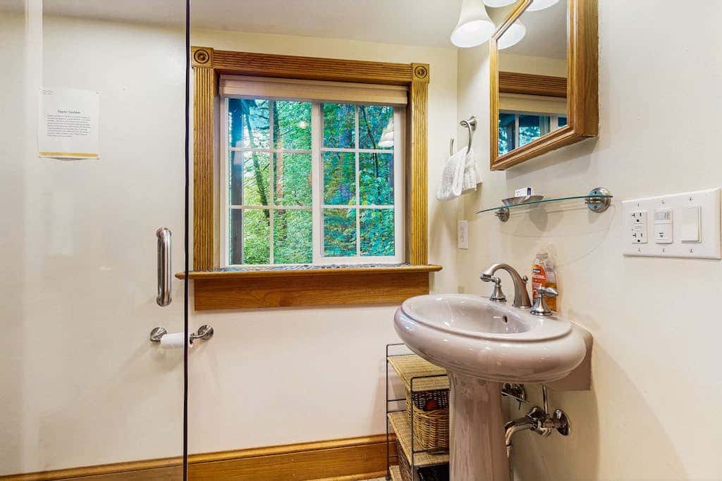 Cozy Riverfront Cottage with Charming Interior & Hot Tub - Dog-Friendly