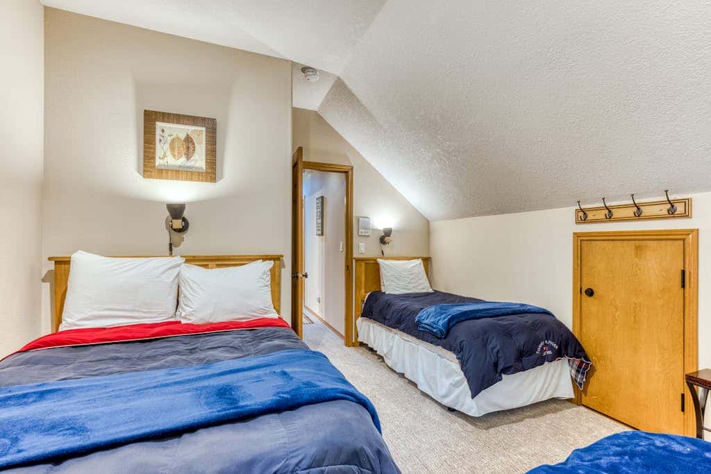 Classic riverfront home with great views, game room, hot tub, & modern cabin feel
