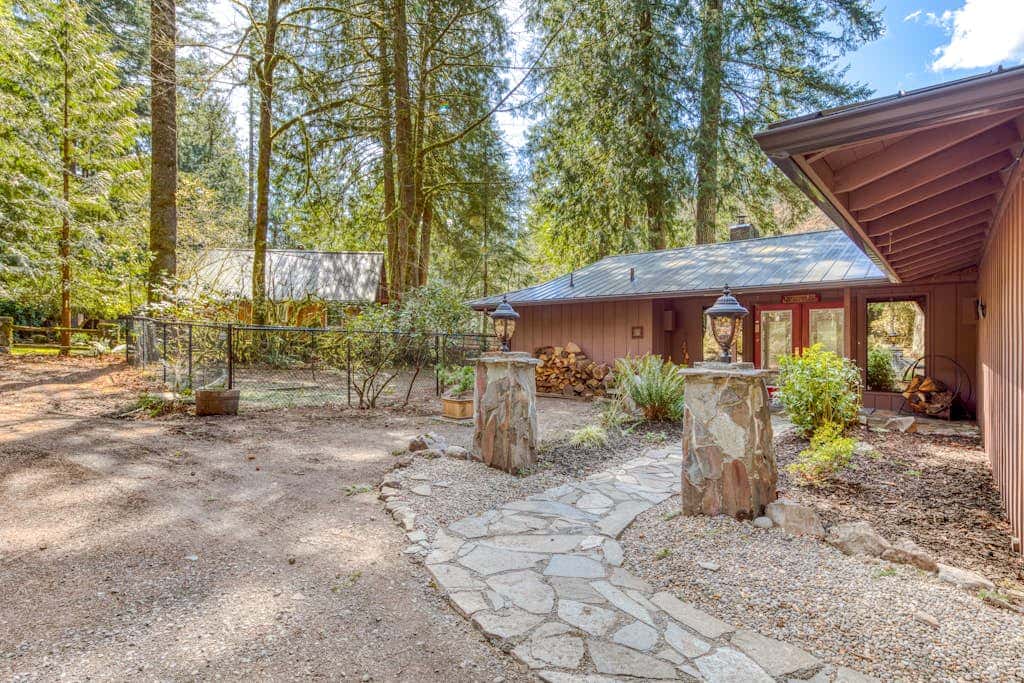 Dog-friendly, riverfront home with a wood-burning fireplace & views