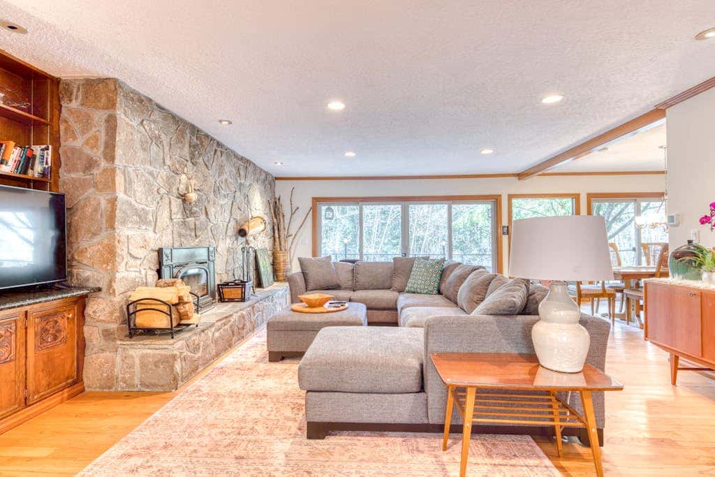 Dog-friendly, riverfront home with a wood-burning fireplace & views