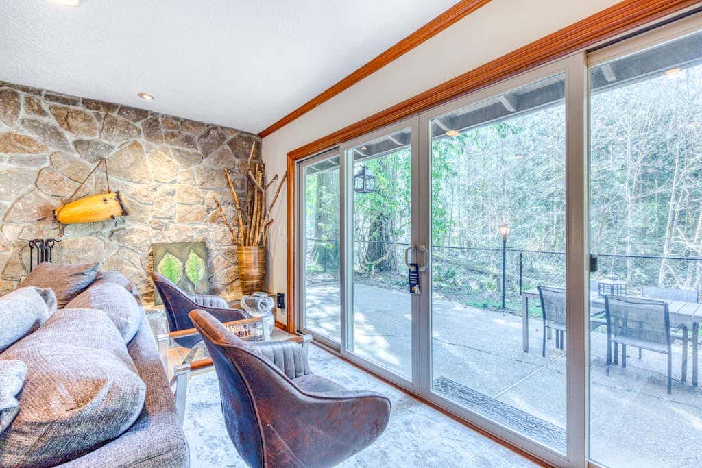 Dog-friendly, riverfront home with a wood-burning fireplace & views