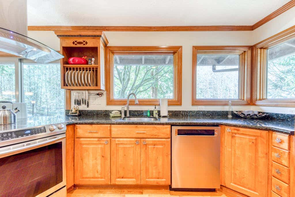 Dog-friendly, riverfront home with a wood-burning fireplace & views
