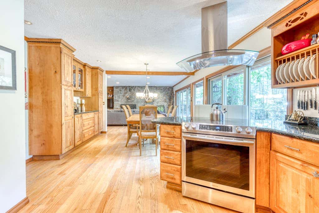 Dog-friendly, riverfront home with a wood-burning fireplace & views
