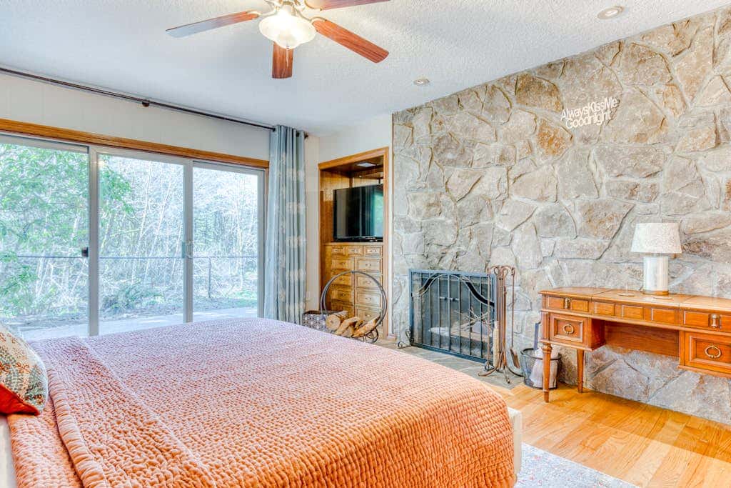 Dog-friendly, riverfront home with a wood-burning fireplace & views