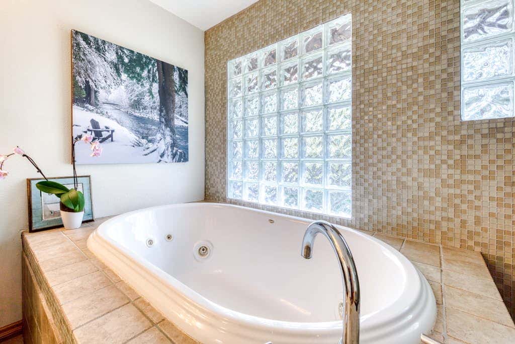 Dog-friendly, riverfront home with a wood-burning fireplace & views