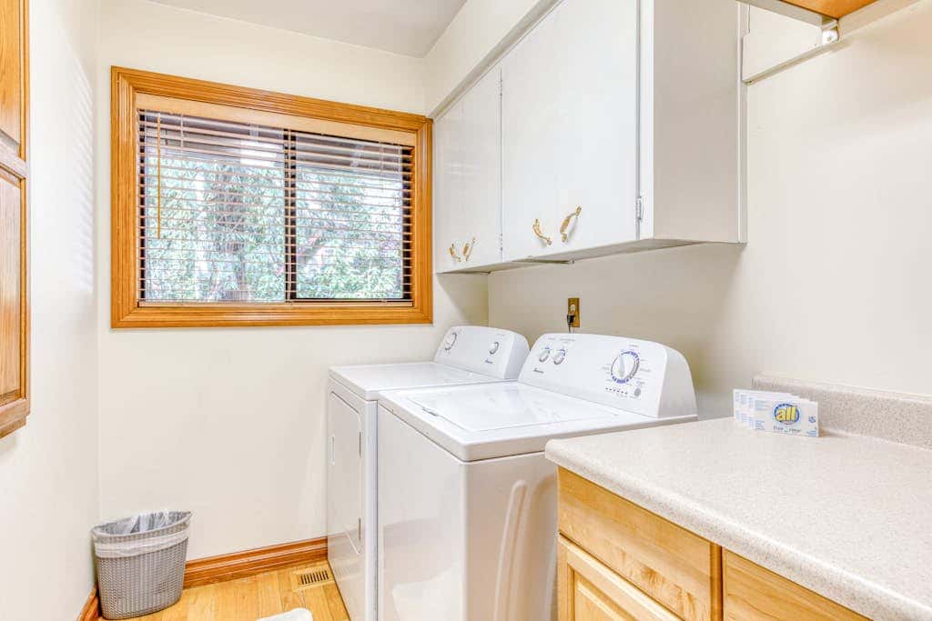 Dog-friendly, riverfront home with a wood-burning fireplace & views