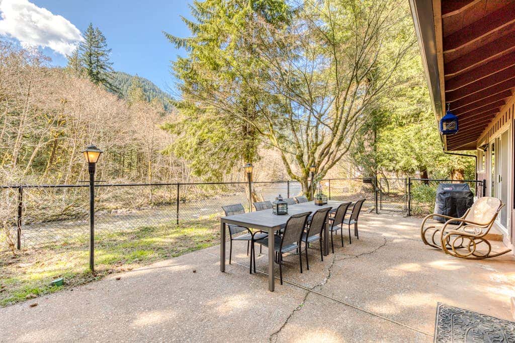Dog-friendly, riverfront home with a wood-burning fireplace & views