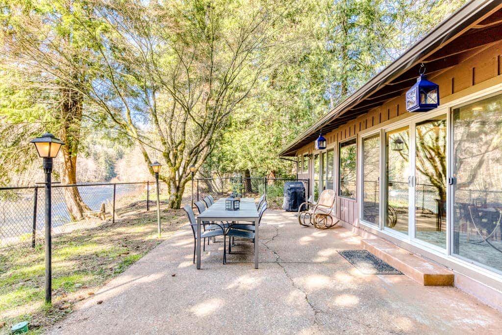 Dog-friendly, riverfront home with a wood-burning fireplace & views