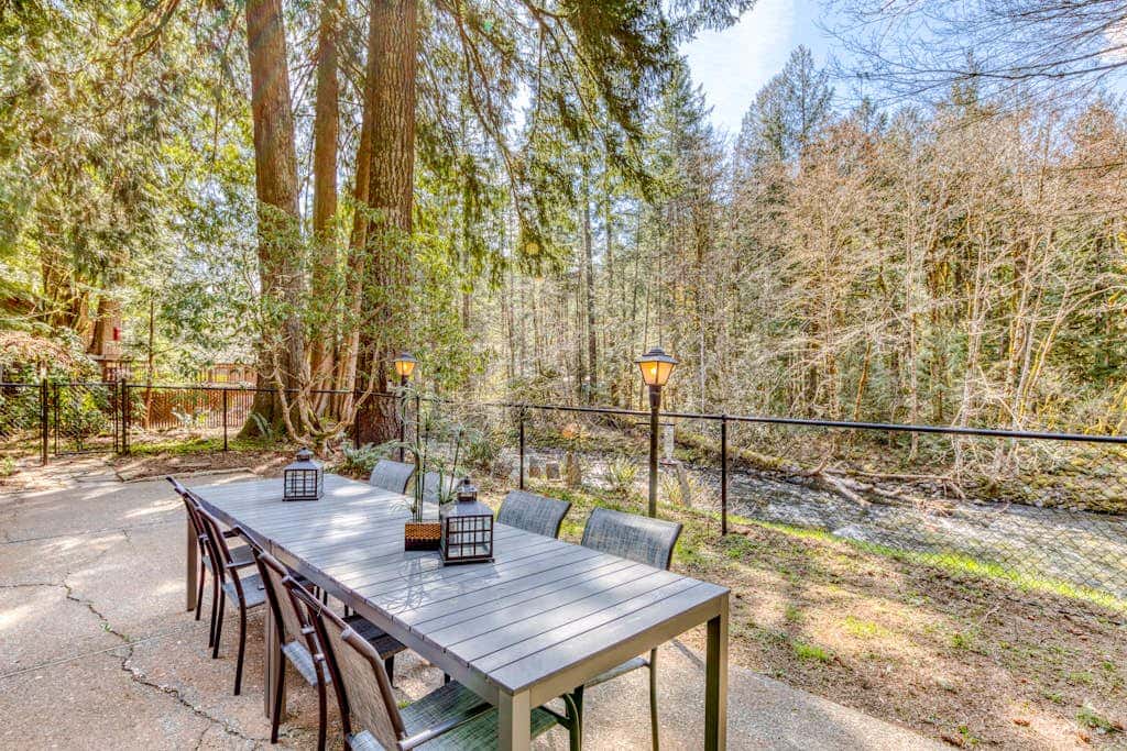 Dog-friendly, riverfront home with a wood-burning fireplace & views