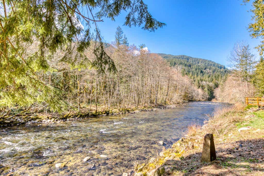 Dog-friendly, riverfront home with a wood-burning fireplace & views