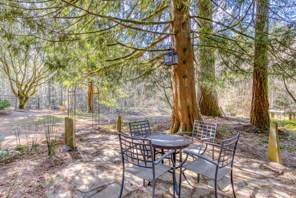 Dog-friendly, riverfront home with a wood-burning fireplace & views