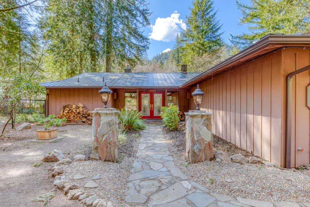 Dog-friendly, riverfront home with a wood-burning fireplace & views