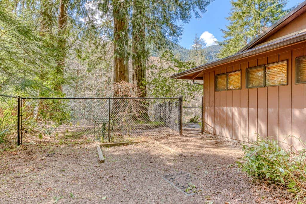 Dog-friendly, riverfront home with a wood-burning fireplace & views