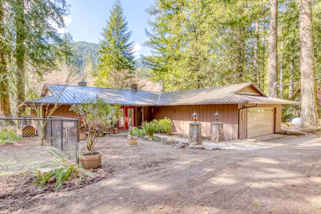 Dog-friendly, riverfront home with a wood-burning fireplace & views