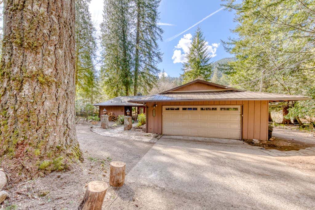 Dog-friendly, riverfront home with a wood-burning fireplace & views