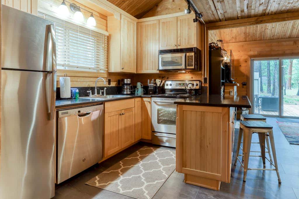 Cozy home with shared pool, sauna, golf, private hot tub & deck - dog-friendly